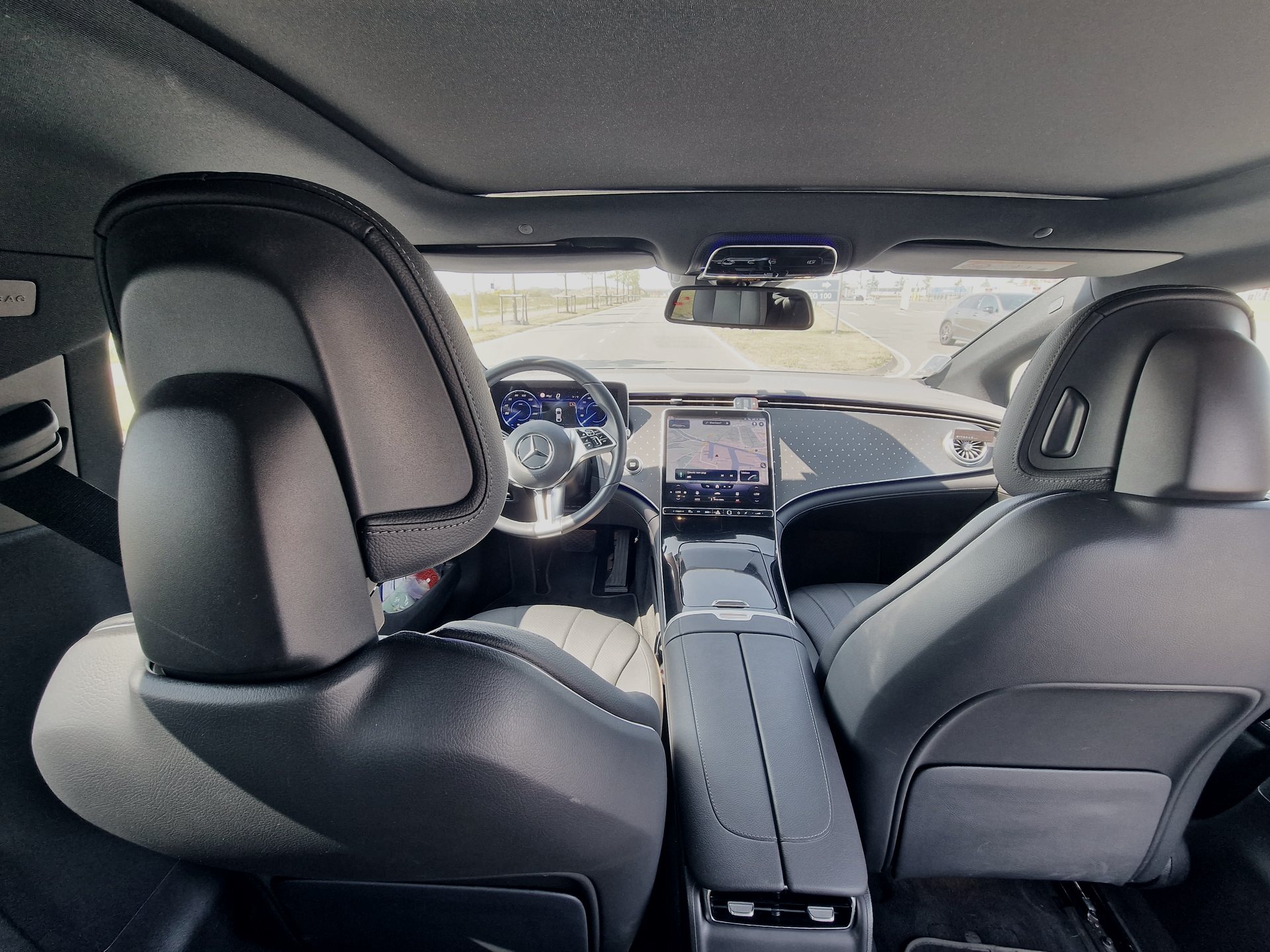 From the rear seat of an AmstelCab Mercedes-Benz EQE, Business Class