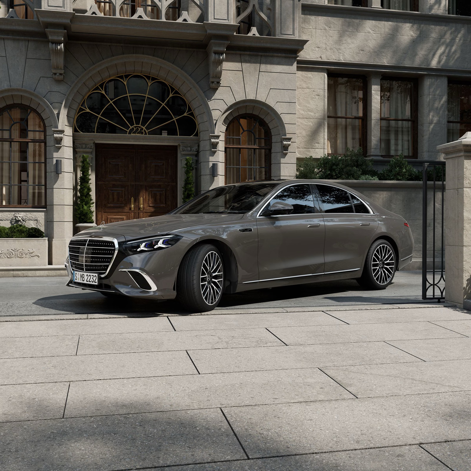 Black Mercedes S-Class waiting with its chauffeur