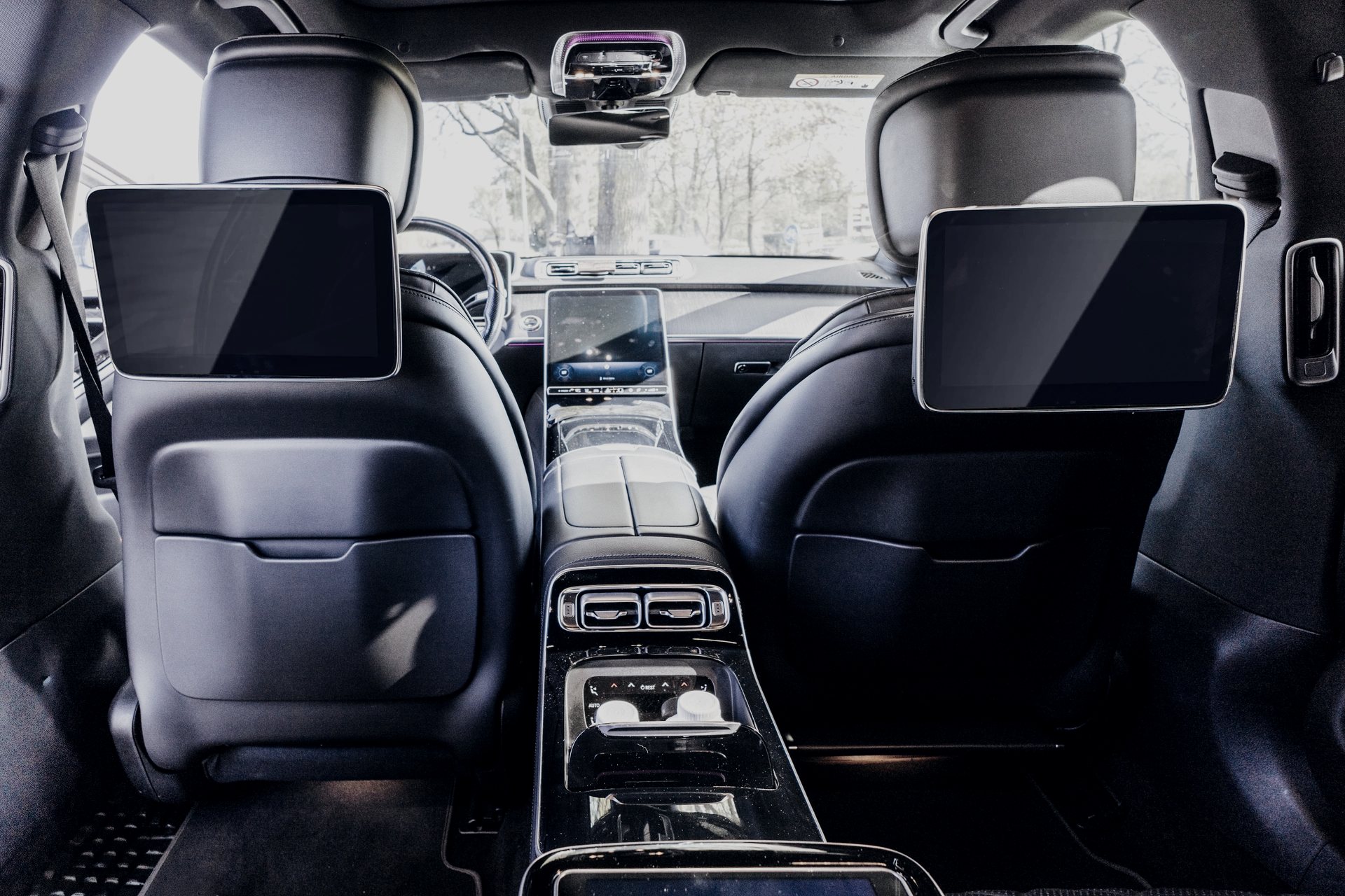 The rear seat of an AmstelCab Mercedes-Benz S-Class, looking forward